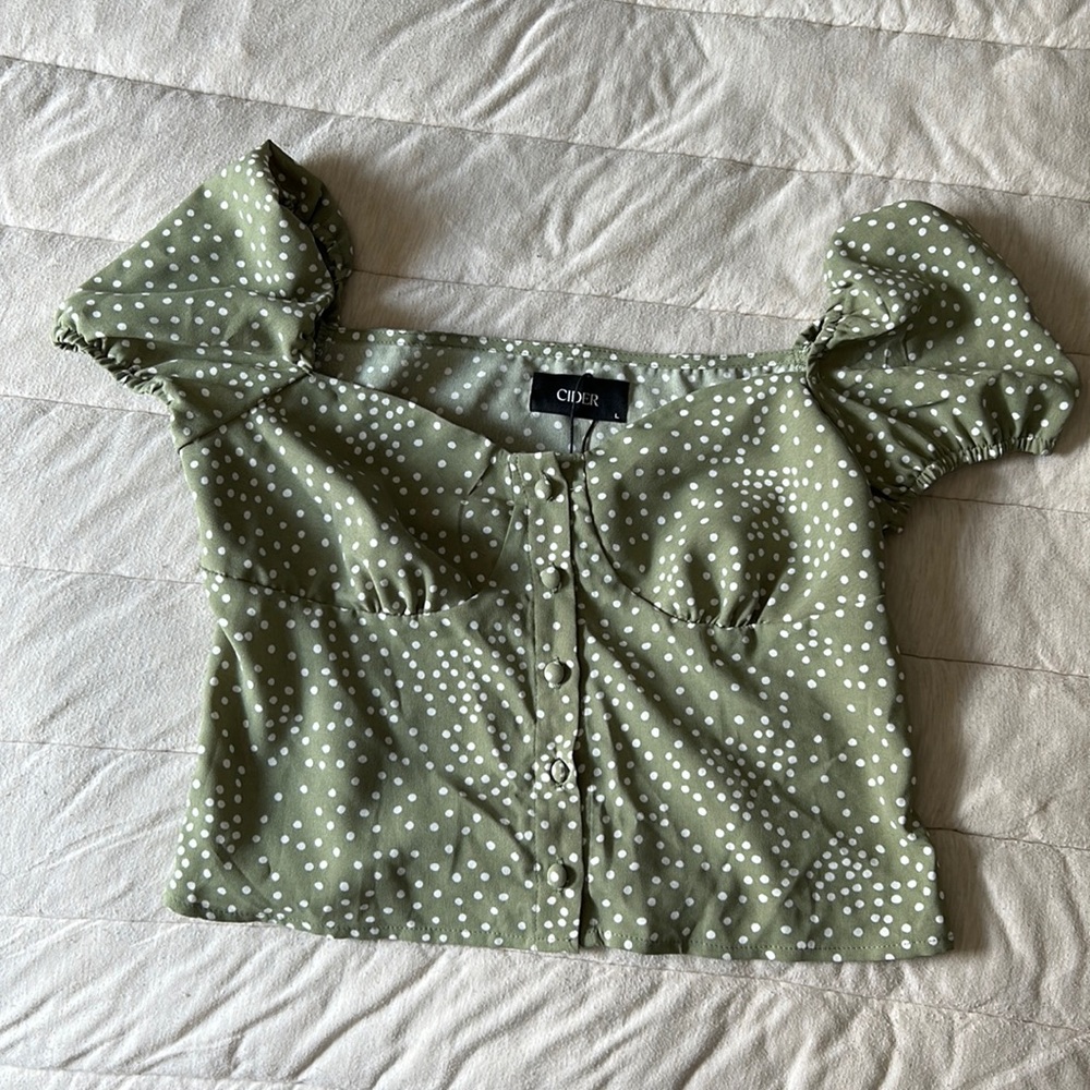 Green polka dot top